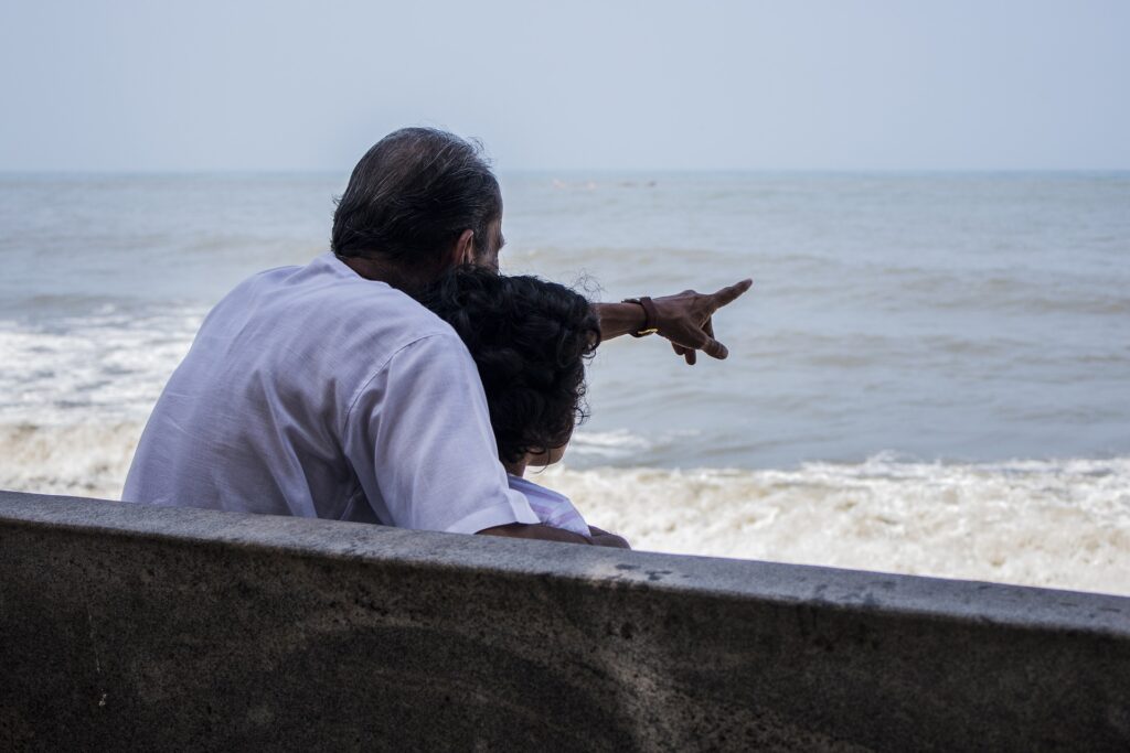 Grandfather sharing stories with Granddaughter